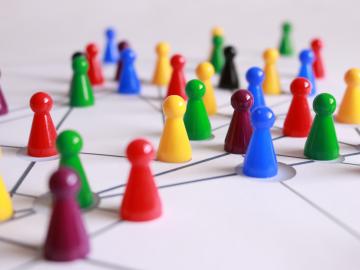 Coloured game board pieces connected by lines