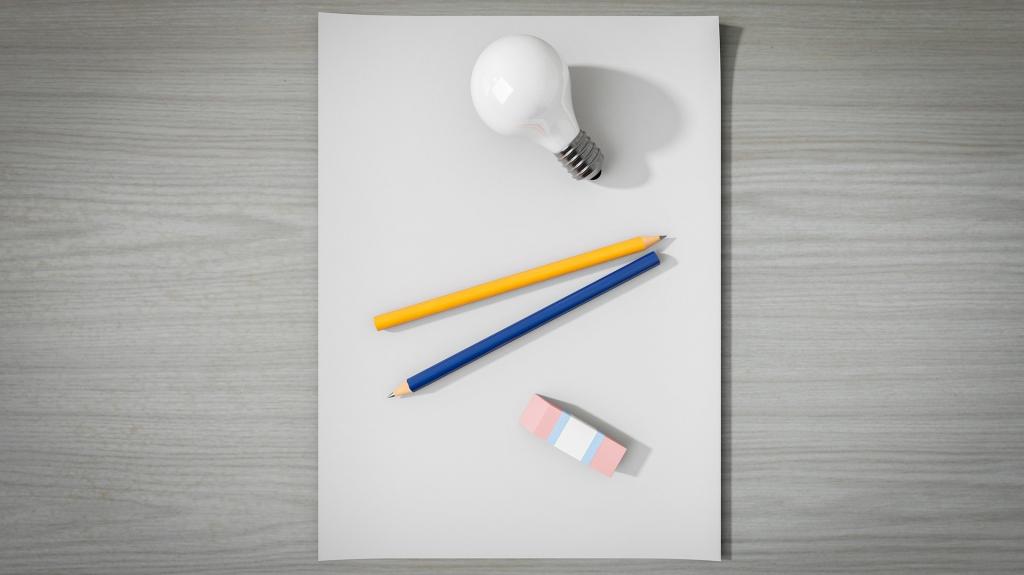 pen paper and light bulb